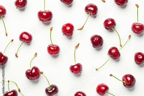 op View of Beautiful Cherries Arranged with Spacing on White Background - Fresh and Vibrant Background for Commercial Use