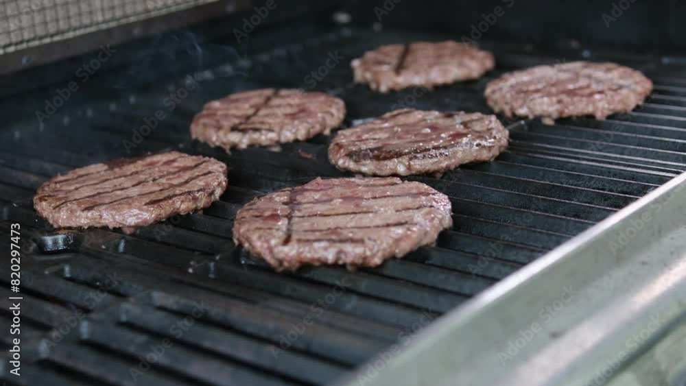 Preparation of beef cutlets. cutlet is fried in a grill pan, close-up Preparation of beef cutlets. cutlet is fried in a grill pan, close-up