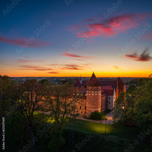 Aerial scenery with the Teutonic Castle in Bytow, a former stronghold for Pomeranian dukes at sunset. Poland