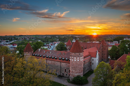 Aerial scenery with the Teutonic Castle in Bytow, a former stronghold for Pomeranian dukes at sunset. Poland