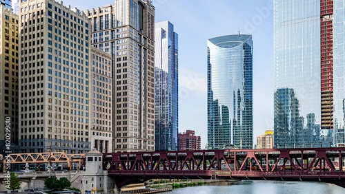 Chicago Skyline Timelapse with Train on Bridge above River