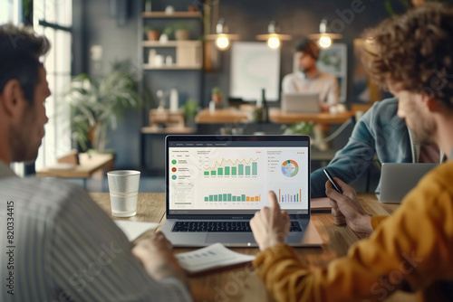 Data analysis concept. Business teamwork working on laptop with key performance indicator (KPI) dashboard on virtual screen. Business analytics planning and strategy data visualization photo