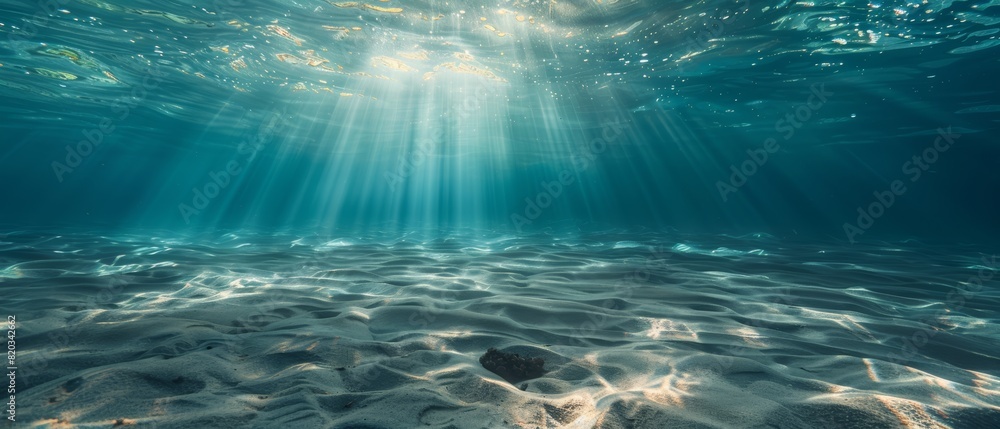 Naklejka premium A peaceful underwater scene with gentle currents and sunbeams filtering through