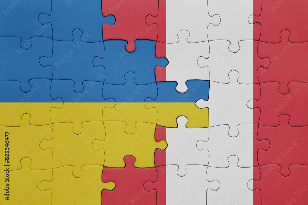 puzzle with the colourful national flag of peru and flag of ukraine. puzzle with the colourful national flag of peru and flag of ukraine.