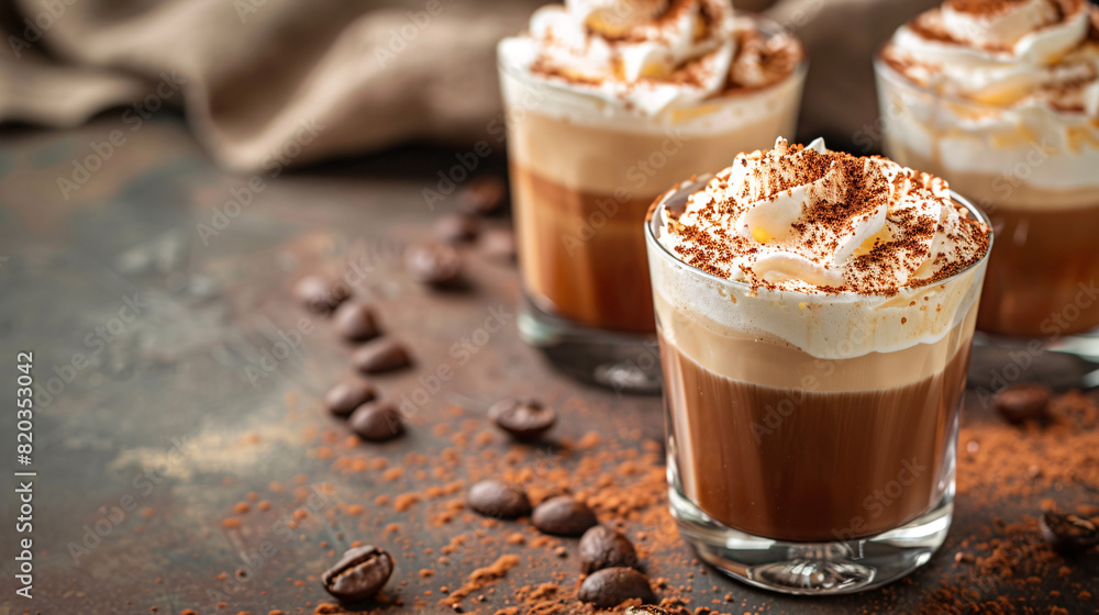 Delicious mocha coffee with whipped cream Close-up of tempting mocha coffees topped with fluffy whipped cream and chocolate shavings, perfect for cozy mornings or dessert moments. Delicious mocha coffee with whipped cream Close-up of tempting mocha coffees topped with fluffy whipped cream and chocolate shavings, perfect for cozy mornings or dessert moments.