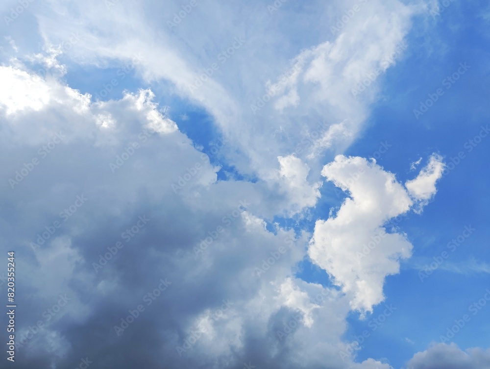 White clouds and blue sky. The view of the clouds and sky is clear and calming
White clouds and blue sky. The view of the clouds and sky is clear and calming