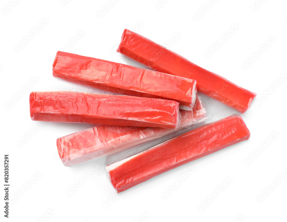 Tasty crab sticks isolated on white, top view Tasty crab sticks isolated on white, top view