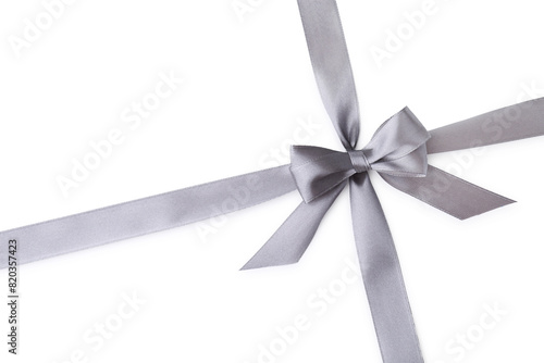 Grey satin ribbon with bow on white background, top view