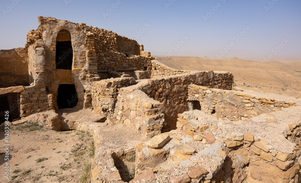 Obraz premium View of old Ksar Beni Barka settlement with ruined storage areas in Tunisia