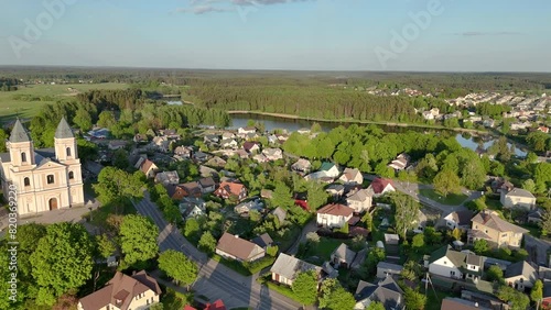 Aerial early summer evening view of Moletai town in Lithuania. Aerial video flight over Moletai, the lake district of Lithuania. photo