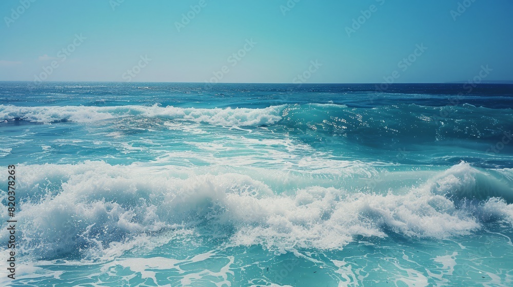 Obraz premium the concept of World Ocean Day. Beautiful nature landscape. World Water Day. A vast ocean with waves, turquoise water, and a clear sky in the distance. 
