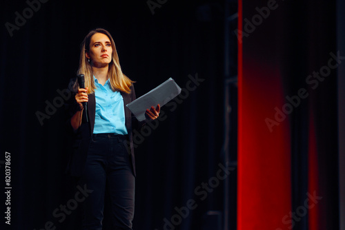 Fotografie Woman Reading a speech Taking Questions on Stage