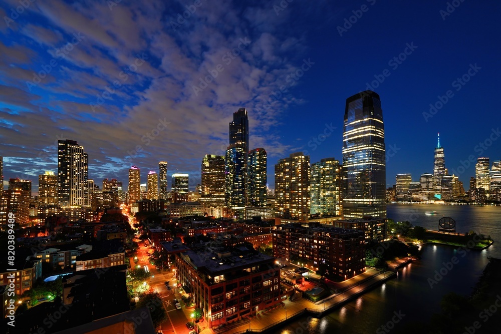 Fototapeta premium Night view of Jersey City and New York.