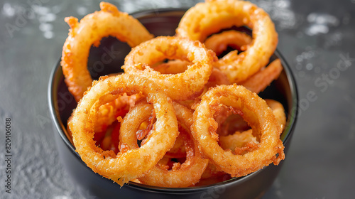 Crispy Fried Onion Rings in Bowl Top View photo