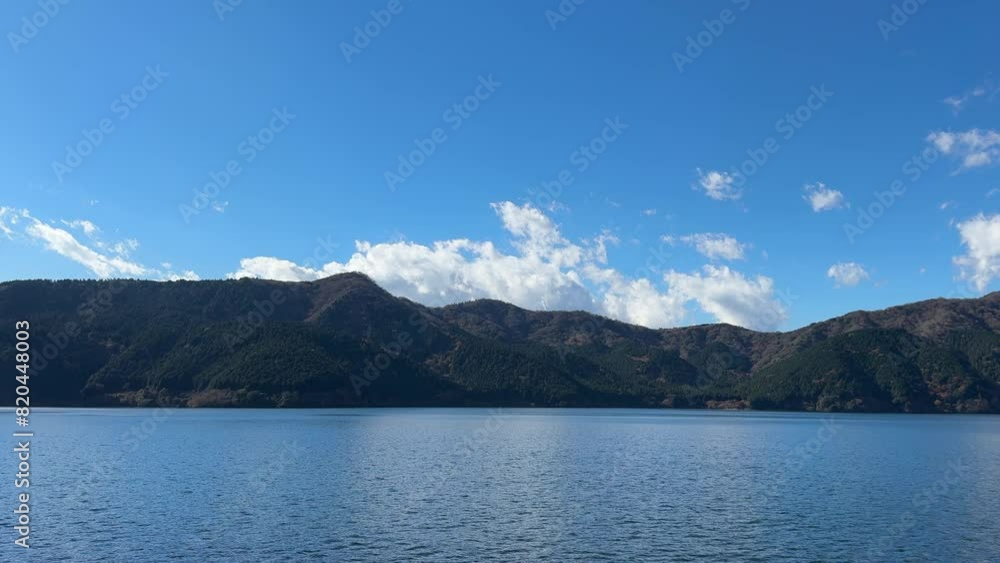 Beautiful lake with clear blue sky and clear water ; japan tourism ; hakone lake Beautiful lake with clear blue sky and clear water ; japan tourism ; hakone lake
