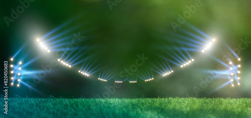 Empty night football arena in lights