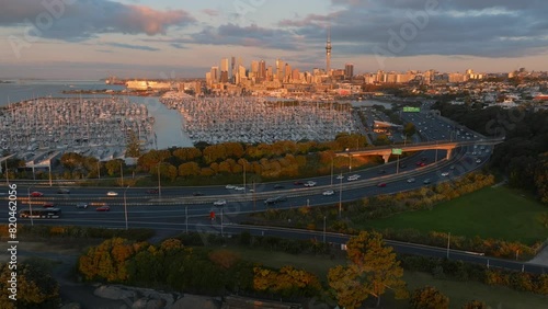 Hyperlapse of motorway traffic in downtown and Westhaven Marina, Auckland, New Zealand. photo