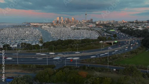 Hyperlapse of motorway traffic in downtown and Westhaven Marina, Auckland, New Zealand. photo