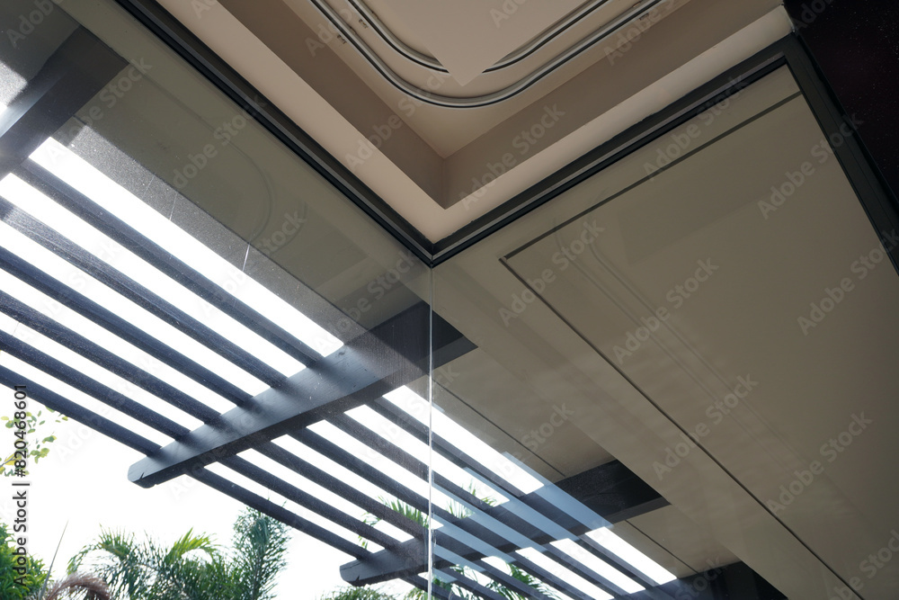 Obraz premium Curtain rails in bedroom corner. Double curtain rails and ceiling board design for room corner, Ideas for bedroom design. Selective focus
