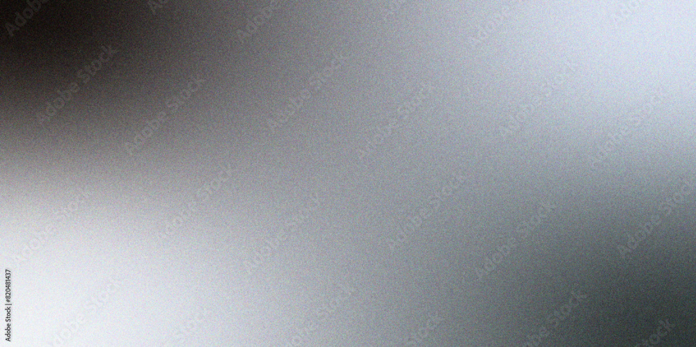 Abstract reflective shiny gray & white foil gradient blurred shine. Glowing Gray foil glitter metallic wall texture. Gray color gradient, ombre effect with rough, grain, noise, and bright spots Abstract reflective shiny gray & white foil gradient blurred shine. Glowing Gray foil glitter metallic wall texture. Gray color gradient, ombre effect with rough, grain, noise, and bright spots