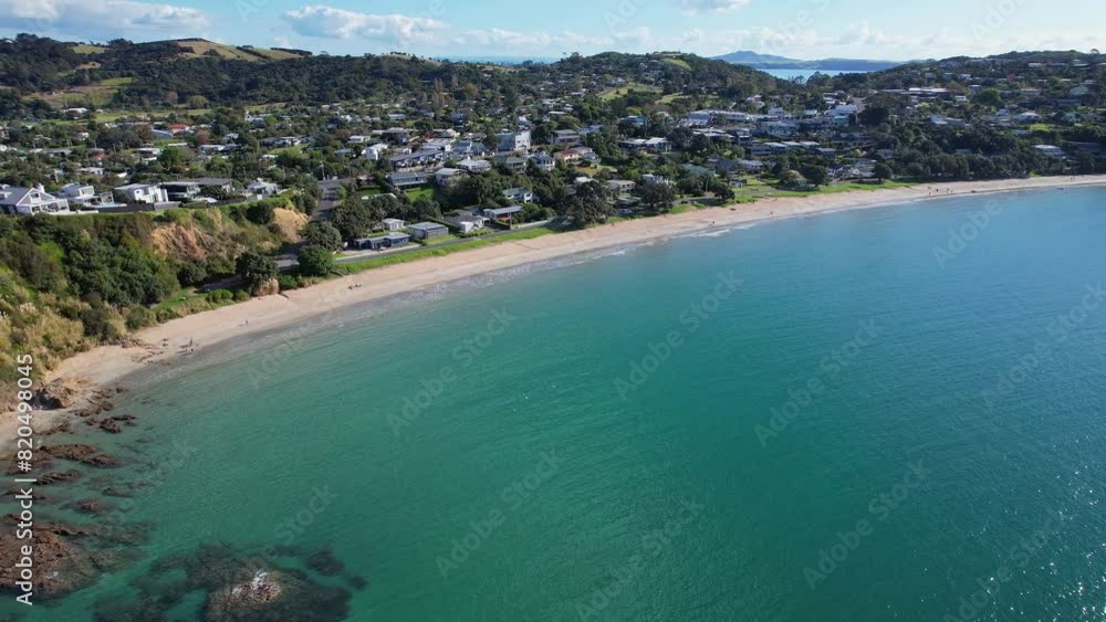 Big Oneroa Beach With Tranquil Ocean In Waiheke Island, New Zealand - Aerial Pullback Big Oneroa Beach With Tranquil Ocean In Waiheke Island, New Zealand - Aerial Pullback