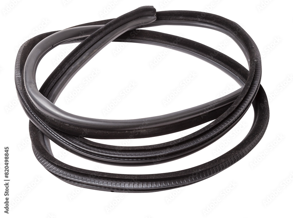 Rolled up black rubber sealant for elements of the car body, doors or trunk, for noise insulation, thermal and sound, preventing heat loss in the car interior. Sealing gasket for repair in a workshop. Rolled up black rubber sealant for elements of the car body, doors or trunk, for noise insulation, thermal and sound, preventing heat loss in the car interior. Sealing gasket for repair in a workshop.