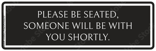 Waiting room sign please be seated. Someone will be with you shortly