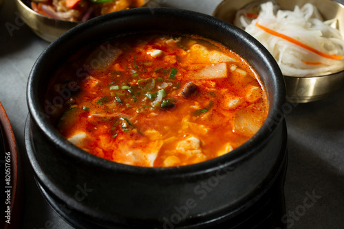 A closeup view of a bowl of soon tofu soup.