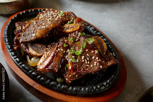 A closeup view of entree of beef galbi. photo