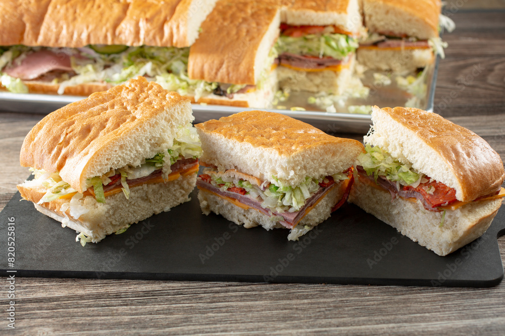 A view of a catering size ciabatta sandwich. A view of a catering size ciabatta sandwich.