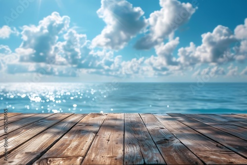 Wood table top on blur sparkling sea water and summer sky background