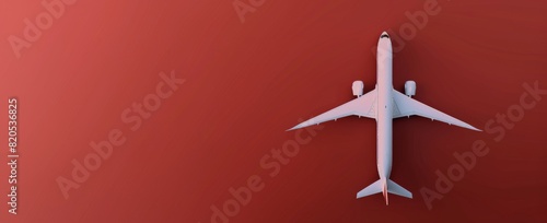 Airplane Flying in the Air on Red Background
