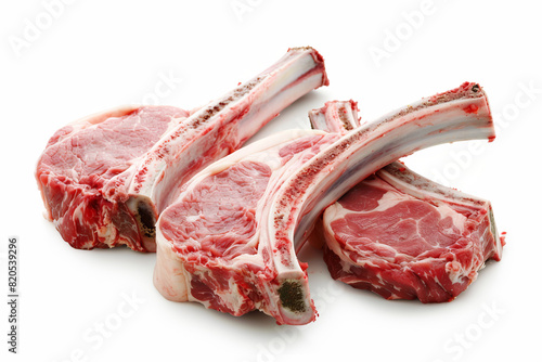 raw pork chops isolated on white background. photo