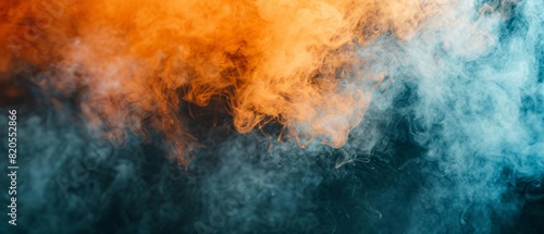 Dynamic abstract of smoke with contrasting blue and orange colors.