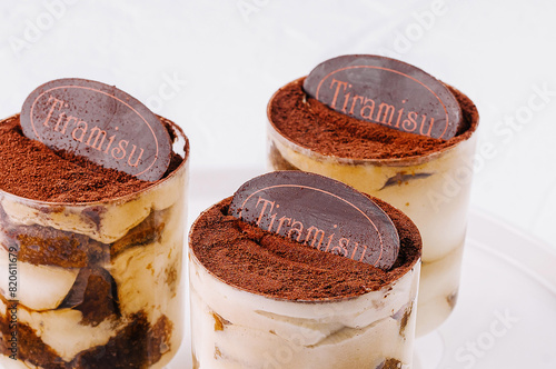 Cuadro en lienzo Tiramisu dessert trio in glass cups