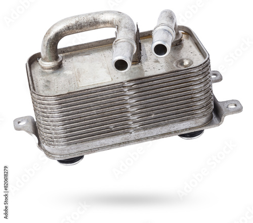 The cooling radiator of gear box is a metal heat exchanger inside filled with antifreeze. Rubber pipes are connected to it, which are mounted on the corresponding neck of the motor.