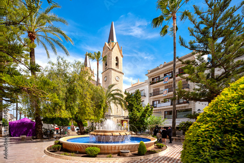 Benissa ,Spain, Costa Blanca. Cathedral Purissima Xiqueta and, fountain in the historic centre of Benissa