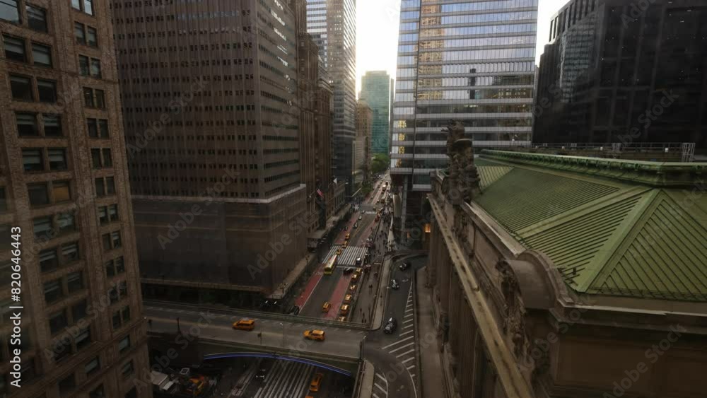 Grand Central Station in New York City Timelapse with a sunset between the buildings Grand Central Station in New York City Timelapse with a sunset between the buildings