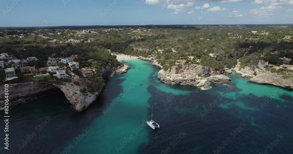 Boat At Cala Llombards Beach In Mallorca, Aerial Tracking Shot Boat At Cala Llombards Beach In Mallorca, Aerial Tracking Shot