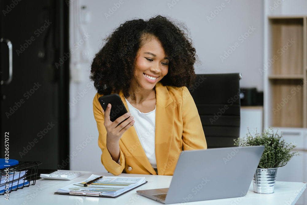 Businessman using laptop computer in office. Happy woman, entrepreneur, small business owner working online. Businessman using laptop computer in office. Happy woman, entrepreneur, small business owner working online.