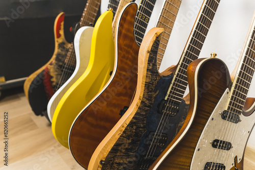 many electric guitars, pop rock artist song music and entertainment instrument. Studio shop. High quality photo photo