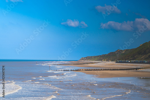 A view of Cromer Beach looking towards Overstrand in North Norfolk, UK