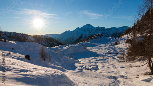 snowy alpine landscape on a beautiful sunny day