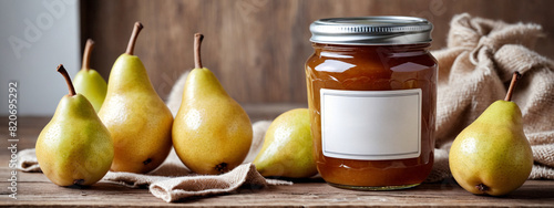 A jar of pear jam and fresh fruits on a wooden table. Place for text. Glass jar of pear jam with blank label for adding reflected text. Jam jar mockup  jar tag for text and logo.