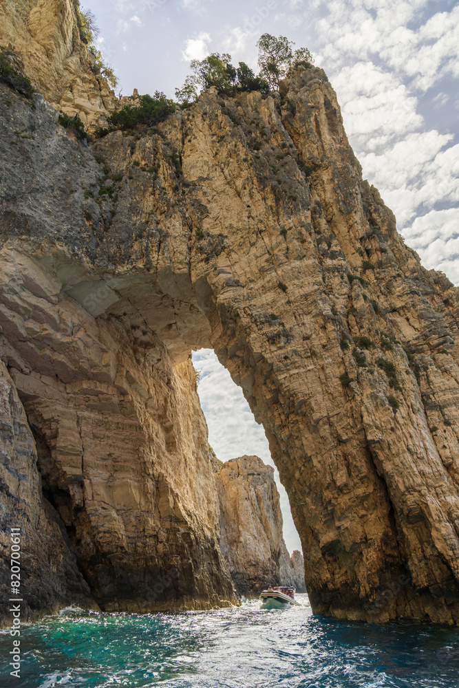 Vertical shot of a natural arch near the Keri caves, Zakynthos, Greece