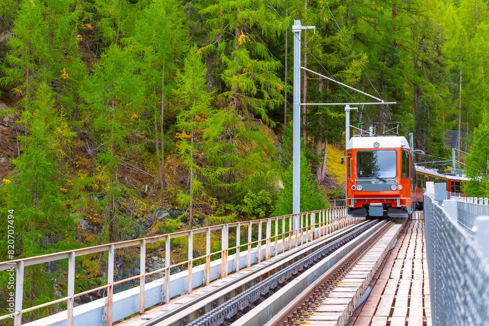 Naklejka premium Zermatt, Switzerland. Gornergrat train on bridge