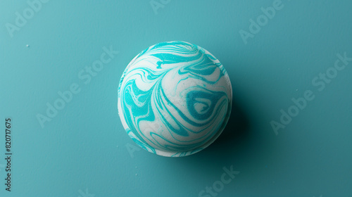 Blue and White Marble Object on Blue Background