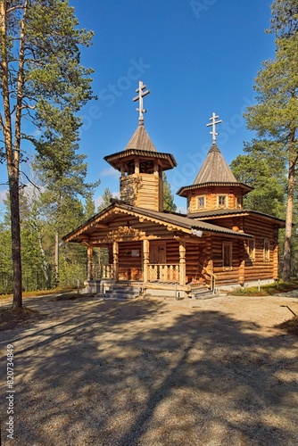 Wooden Nellim orthodox church in clear spring weather, Nellim, Lapland, Finland. photo