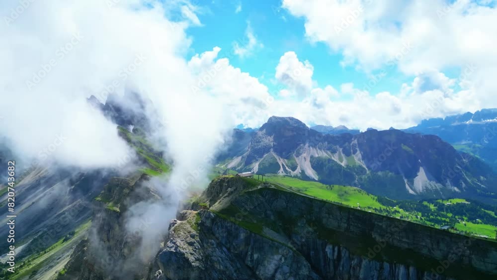View from above, stunning aerial view of the mountain range of Seceda during a cloudy day View from above, stunning aerial view of the mountain range of Seceda during a cloudy day