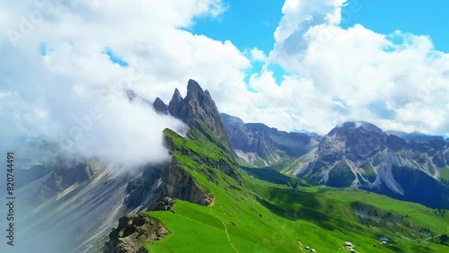 View from above, stunning aerial view of the mountain range of Seceda during a cloudy day